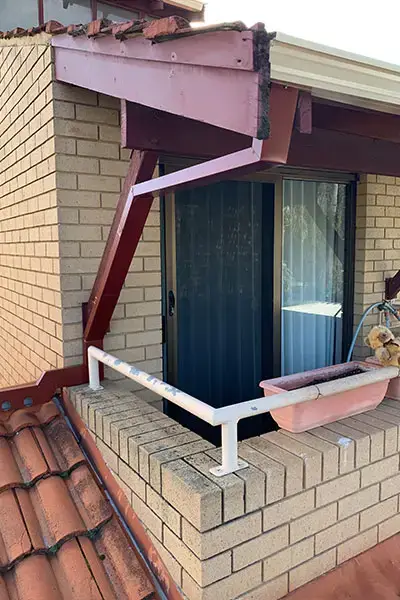 Downpipe replacement and roof plumbing installation on a residential home in Perth