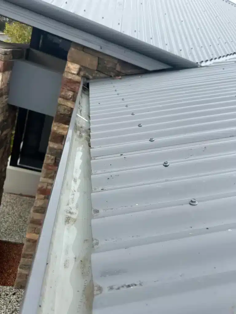 Roof gutter after Gutter Cleaning Perth service showing clean and clear drainage system