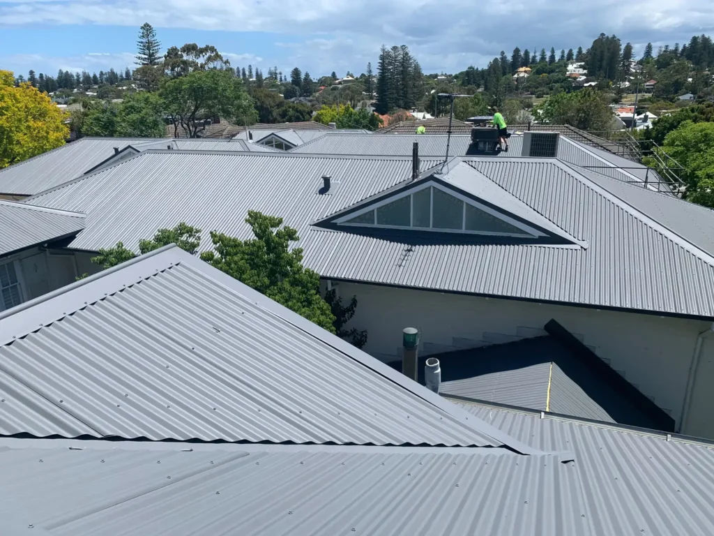 Completed metal roof restoration in Perth showing clean, newly restored roofing on a residential home with durable finish