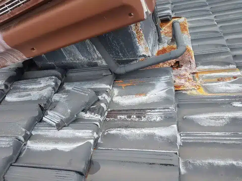 roof leak caused by damaged flashing and rusted gutter Perth home