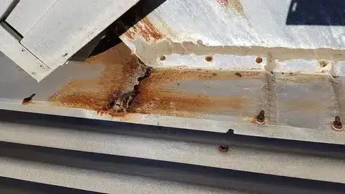 rusted metal roof sheet with water damage and corrosion Perth home