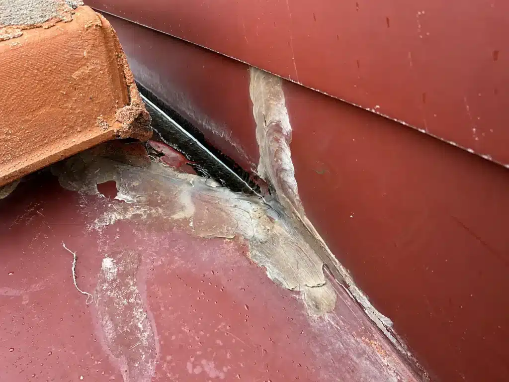 Roof leak inspection around flashing on a City Beach roof